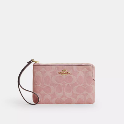 Coach Corner Zip Wristlet In Signature Denim