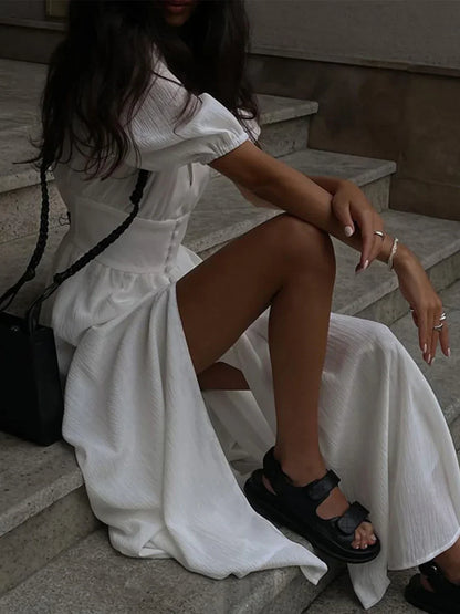 Anais | Long dress with puff sleeves, buttons, and slit