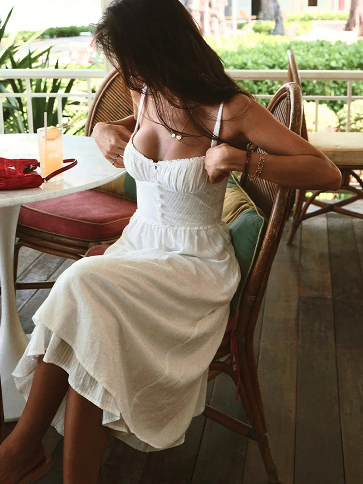 Iris | Solid color midi dress with thin straps and ruffle at the hem