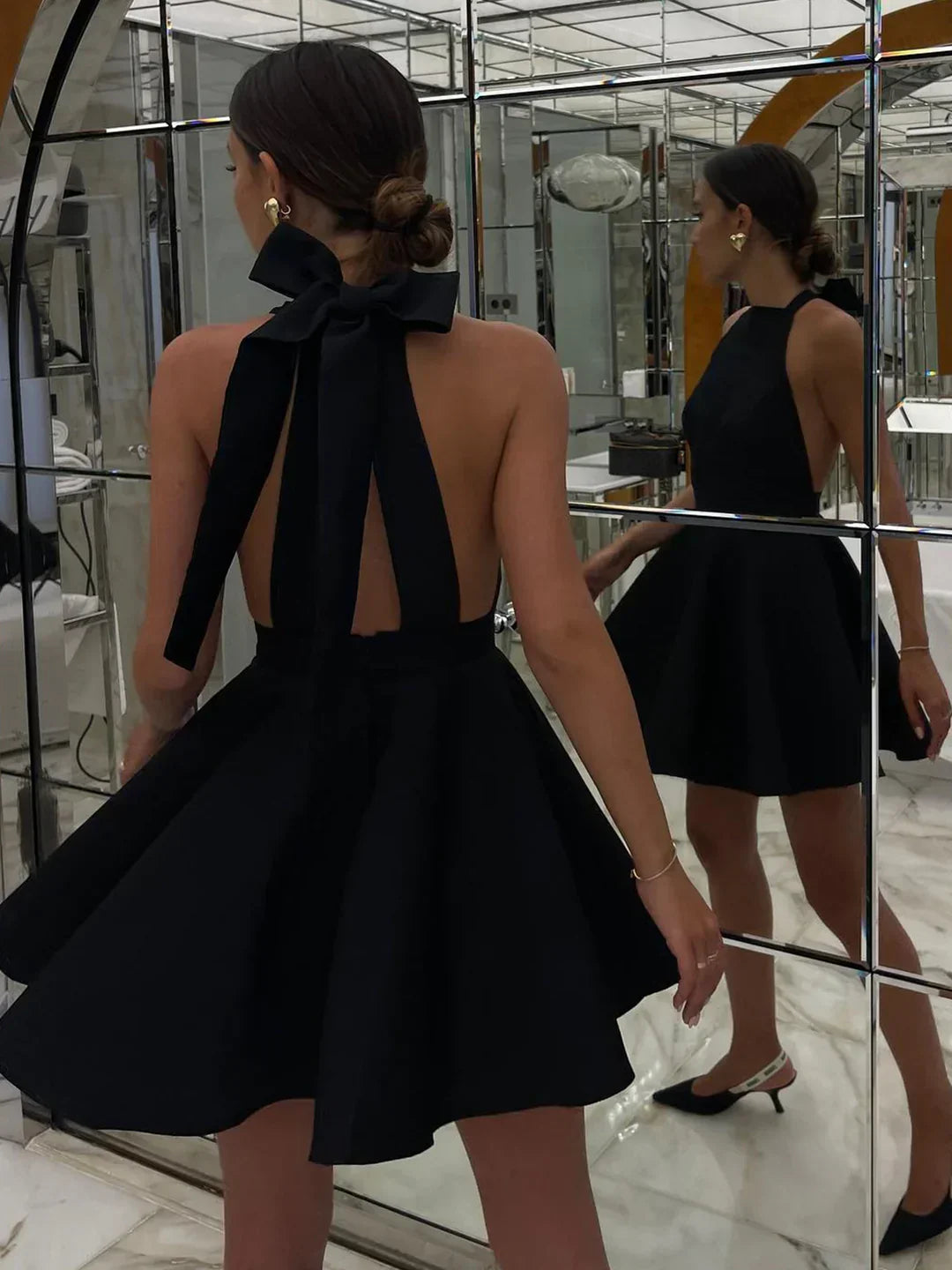Carolina | Mini pleated satin dress with knot, double pockets, and open back