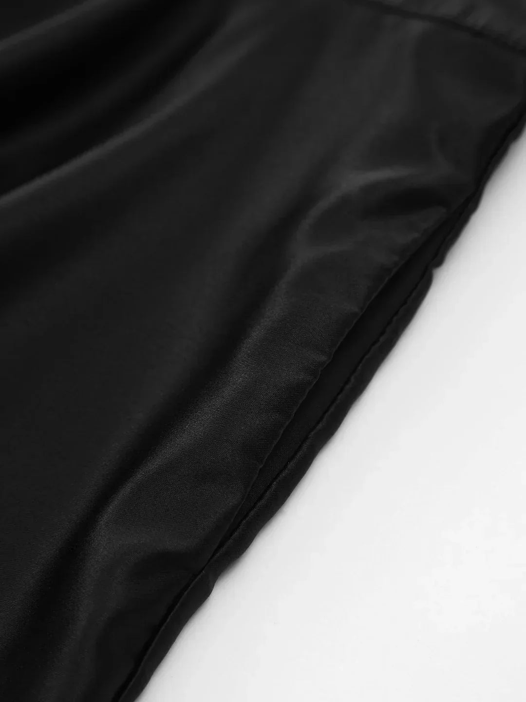 Carolina | Mini pleated satin dress with knot, double pockets, and open back