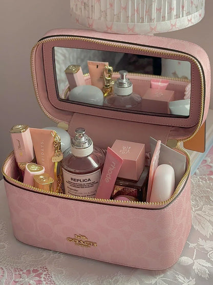 Signature Coach Cosmetics Bag.
