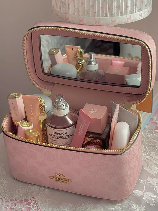 Signature Coach Cosmetics Bag.