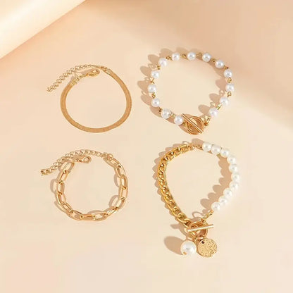 Set of 4 Chic Gold Bracelets – Snake, Pearls, and Links | Gold